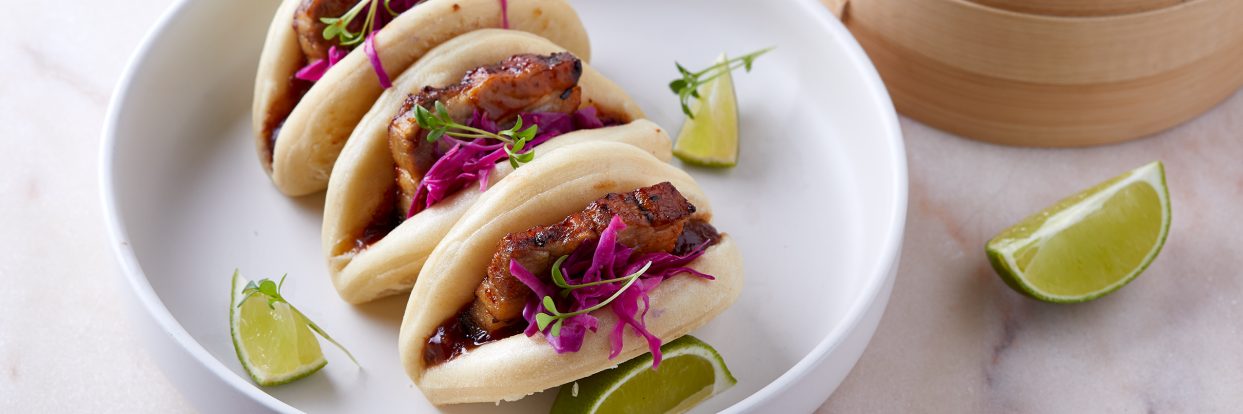 Bao bun with caramelised pork belly and a BBQ sauce