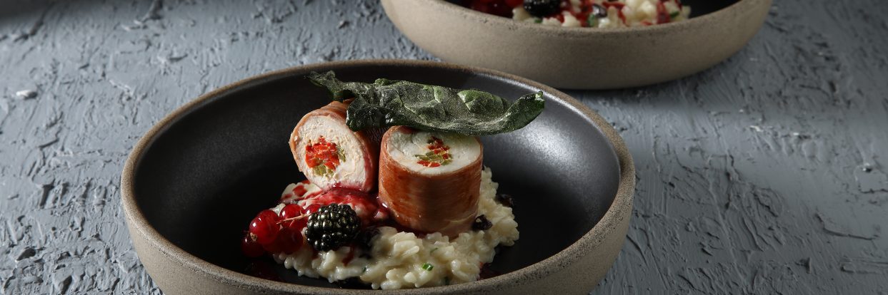 Chicken Ballotine with Risotto, Parmesan, Raisins, and Red Fruit Sauce