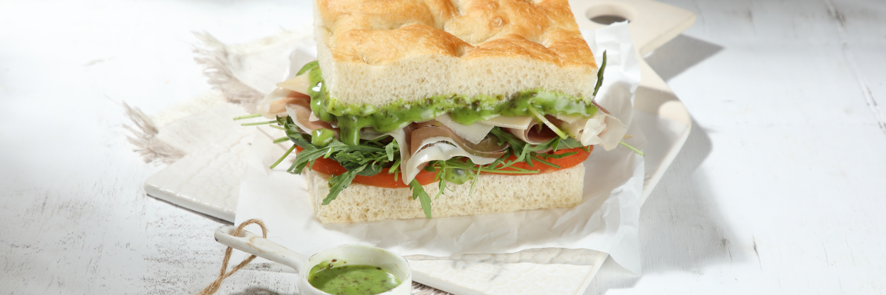 Focaccia with prosciutto and basil pesto
