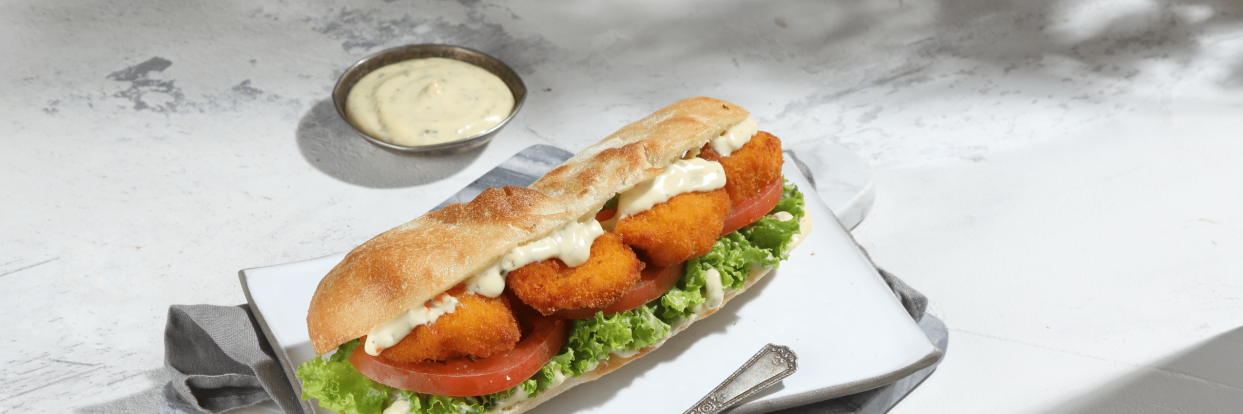Panini with chicken nuggets and smokey sandwich cream