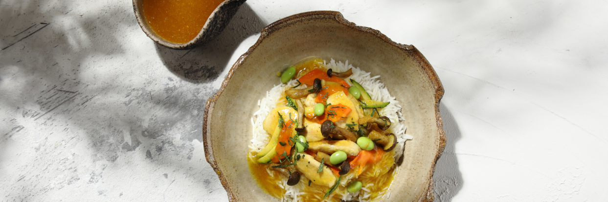 Sweet and sour chicken curry in aromatic rice
